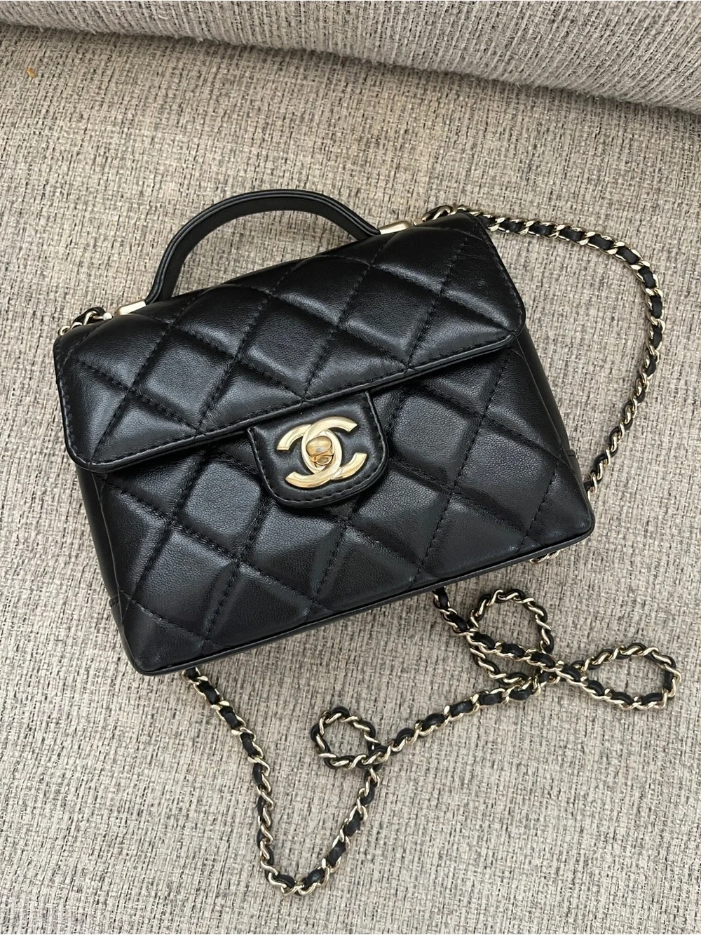 CHANEL Black Quilted Leather Top-Handle Crossbody with Gold Hardware